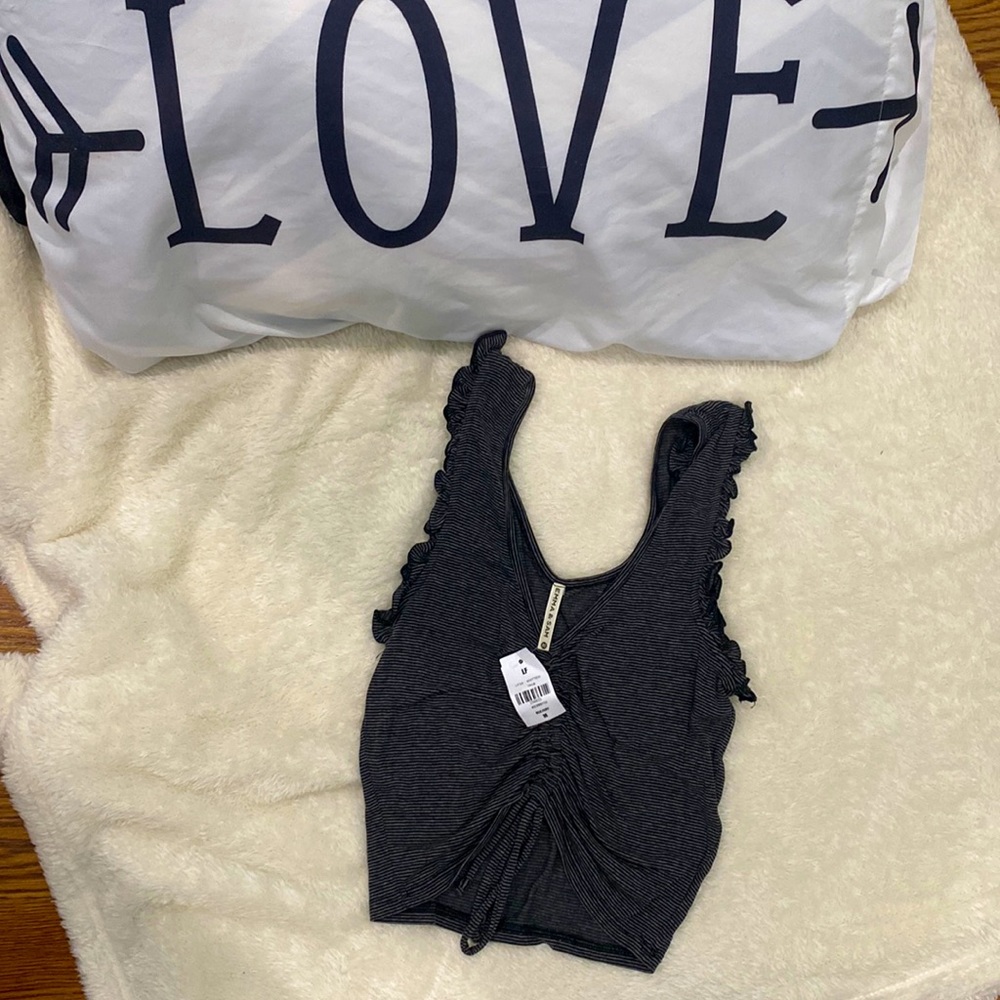 Brand new with tags crop top. Size M